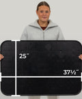 Person holding Beefy Extra Large Drip Tray Mat For Garage And Home, Heavy Duty Utility Pan, 37 by 25 inches, 2 pack