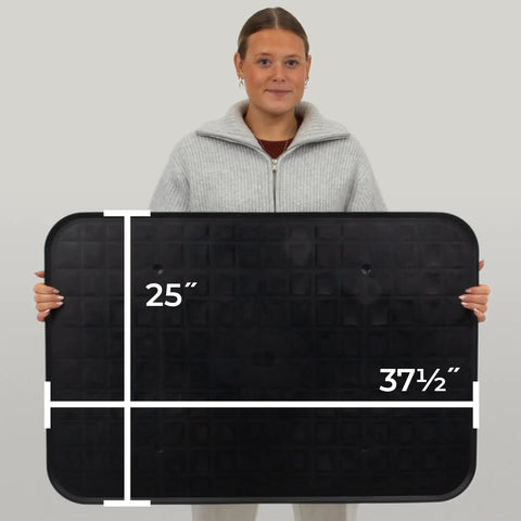 Person holding Beefy Extra Large Drip Tray Mat For Garage And Home, Heavy Duty Utility Pan, 37 by 25 inches, 2 pack