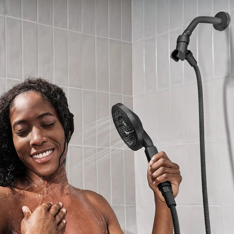 Woman using Neo Exhilaration High Pressure Handheld Shower Head With 2 GPM Flow Matte Black Adjustable Spray in shower