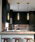 PRTSER 11.8" Modern Pendant Light Fixture with Smoke Gray Crystal Lampshade in a stylish kitchen setting.