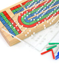 Clear Acrylic Cribbage Board Template Kit With Twelve Colorful Counting Pegs For Game Night Essentials on wooden board.