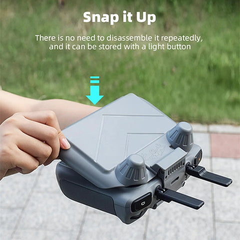 RC Sun Hood Shield for DJI RC 2 Controller being easily attached with a snap, showcasing ease of use and design, Mavic 4 Pro ready.