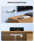 Power Strip Surge Protector With Five Widely Spaced Outlets Three USB Ports Including USB C Six Foot Flat Plug 1440 Joules Surge Protection 1250 Watts At 125 Volts Wall Mountable For Home Office White mounted on wall under desk.