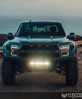 Front view of Ford F-Series truck with Beefy 50 Cal Bullet Antenna For Ford F Series F150 F250 F350 Super Duty Raptor Bronco and Ram