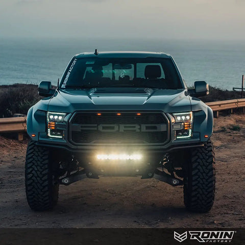Front view of Ford F-Series truck with Beefy 50 Cal Bullet Antenna For Ford F Series F150 F250 F350 Super Duty Raptor Bronco and Ram