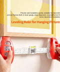 Professional 3 In 1 Picture Hanging Tool And Spirit Level features precision measuring ruler shown level with framed art.