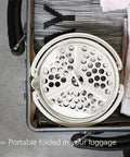 Foldable Electric Travel Hot Pot For Camping And Office stored in luggage, showcasing compact and lightweight design