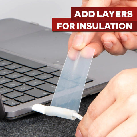 Clear Self-Fusing Silicone Tape Pro, 1.5 Inch By 15 Foot, 30 Mils, applied to laptop cable for insulation
