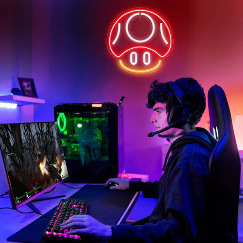 Mushroom Neon Sign For Gaming Room Decor Red LED Wall Light in vibrant game room setup with gamer at computer desk.