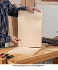 Fitting stopped dado joint with 32 Inch Router Dado Jig for precise woodcuts on plywood, showcasing clamping and alignment.