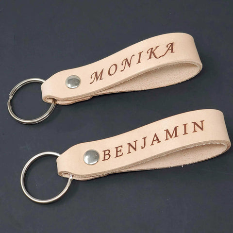 Top Shelf Natural Veggie Tan Leather Keychain Blanks 10 Pack with names MONIKA and BENJAMIN for custom engraving.