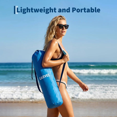 Woman carrying bag with Two Pack Folding Beach Chairs For Adults With Cup Holder, Storage Pocket And Carry Bag