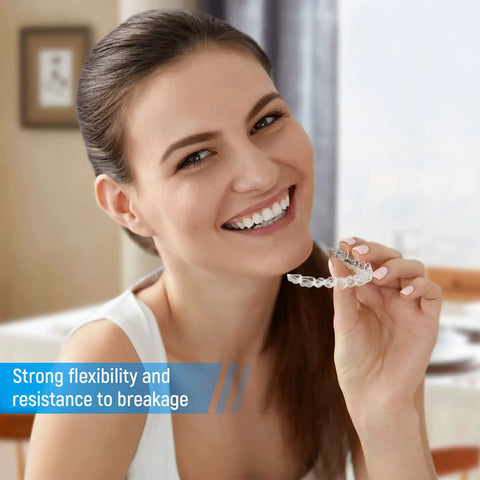 Person holding Bubble-Free 2.0mm Thermoforming Sheets For Dental Lab Splints in a dental setting, showcasing flexibility.