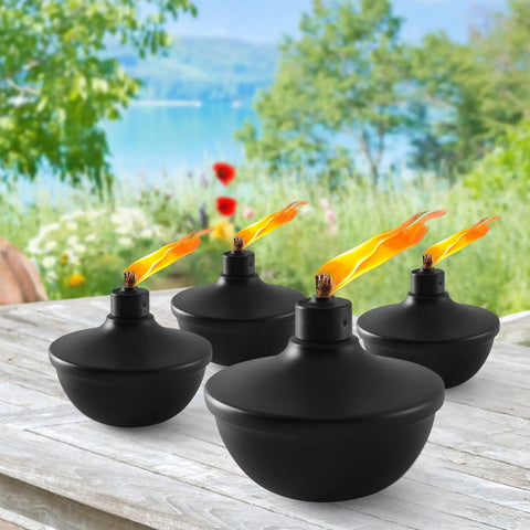 Four Six Pack Metal Table Top Torches With 23.5 Oz Citronella Fuel For Outdoor Parties And Garden Decor on wooden table.