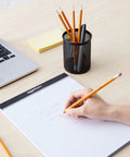 Pre Sharpened Number Two Hb Wood Cased Pencils With Top Erasers Smooth Writing Orange Pack Of Thirty Campus Crew Essentials Back To School Grind Stress Free Study Vibes For Every Student on desk with notepad.