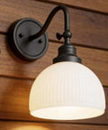 SongCiLT Vintage Wall Sconce 1-Light with White Striped Glass Globe Shade mounted on a wooden wall with an elegant design.