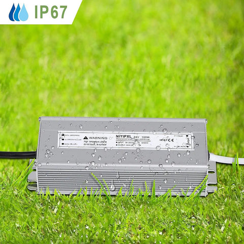 Heavy Duty 24V DC LED Driver 100W Power Supply Waterproof IP67 Transformer on grass with water droplets