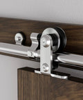 Stainless Steel Sliding Door Hardware Kit For Single Wooden Door Top Mount T Style Track System 6 Ft Length Fits 36 Inch Wide Door Panel Durable Anti Rust Barn Door Hardware For Modern Homes, showing close-up of mounting hardware on a wooden door.