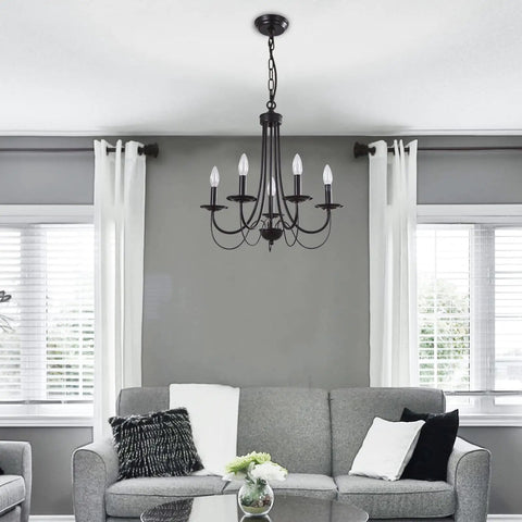 Dope Five Light Farmhouse Chandelier Black Candle Style Ceiling Light Fixture in living room with sofas and curtains