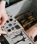 30 Count Durable Silicone Fan Mount Screws For Computer Cases shown being installed in a computer chassis.