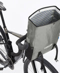 Mule 12 Bikepacking Waterproof Handlebar Bag With Roll-Top Design, Expandable Capacity on bike, showing open top view.