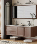 Modern bathroom with wood vanity, large mirror, and two faucets; wall-mounted lights and decor visible