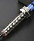Close-up of Inductive Proximity Sensor Switch M8 5V DC, 200mA Output, NPN Normally Open, with cable and metal detection components