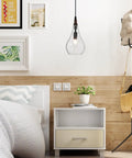 Cozy Farmhouse Seeded Glass Pendant Light With Wooden Teardrop Socket hanging in a stylish bedroom setting