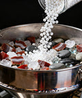 Pouring 8 Pound Ceramic Tumbling Media Balls For Rock Tumblers Reusable White Alumina Pellets Three Tenths Inch Diameter into tumbler