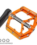 Orange Aluminum Alloy 6061 CNC Machined MTB Pedal 9 Sixteenth Inch Wide Platform with CrMo Steel Axle and Three Bearings