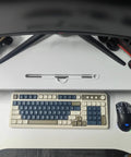 Top view of 32 Inch Height Adjustable Standing Desk Riser For Home Office And Gaming, with keyboard and mouse on the white platform.