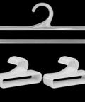 Set Of 50 White Plastic Hangers For Retail Display And Home Closet Organization, showing hook and horizontal bar design