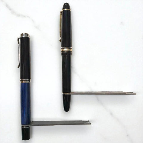 Pro Grade Heavy Duty Fountain Pen Repair And Disassembly Wrench For Nib And Piston Removal alongside two pens