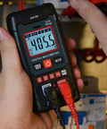 4000 Count Digital Multimeter With Backlit Display Auto Range Handheld Tester for AC and DC Voltage Measurement in use