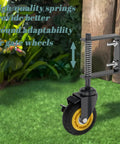 Two Pack 4 Inch Gate Casters With Brake Heavy Duty 250 Lb Capacity Spring Loaded Absorbing Solid Rubber Wheels For Wood Gates Includes Screws And Screwdriver installed on a wooden gate, showing spring and rubber wheel.