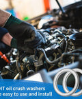 Mechanic installing Heavy Duty M18 Aluminum Oil Drain Plug Gasket Crush Washers Kit on Volvo engine