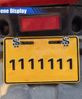 Fresh Ride Upgrades Four Piece Set Of Dope Black Us Dollar Car License Plate Screws Heavy Duty Carbon Steel And Abs Plastic Fasteners That Resist Rust And Weather While Keeping Your Setup Looking Straight Fire Every Single Day on a vehicle rear with yellow background.