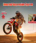 Rider on HAPPYRUN F18 Electric Dirt Bike Mid-Drive Motor 6000W Peak, showing wheelie and suspension system detail