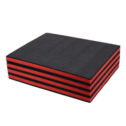 Stack of Cuttable Polyethylene Tool Box Shadow Sheets in red and black with customizable foam padding for easy tool storage organization.