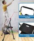 Person using Two Step Folding Ladder With Wide Anti Slip Pedals And Comfort Handle Lightweight Steel Heavy Duty 500 Pound Capacity