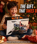 Child holding Big Power 2.4GHz RC Plane For Kids And Adults Easy To Fly Foam Airplane With LED Lights box near Christmas tree