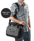Man holding Soft Sided Cooler With Hard Body Liner And Smart Shelf Insulated Bag For Lunch And Travel, 16 Can Capacity