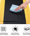 Hand cleaning the Heavy Duty Anti Fatigue Floor Mat For Industrial Workshops And Garages, diamond plate vinyl, non-slip surface, 3x5 ft.