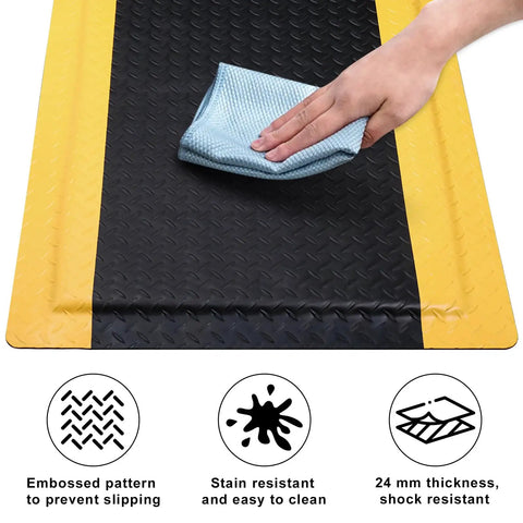 Hand cleaning the Heavy Duty Anti Fatigue Floor Mat For Industrial Workshops And Garages, diamond plate vinyl, non-slip surface, 3x5 ft.