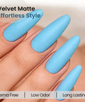 Close-up of nails painted with Hema Free Gel Nail Polish Baby Blue With Matching Bottle And Color Coordinated Shade One Bottle