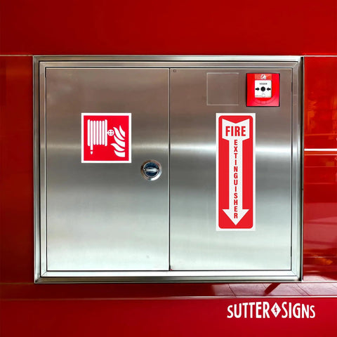 12 Pack Fire Extinguisher Arrow Down Decals 4x12 Inches Self Adhesive Weatherproof Vinyl displayed on metal cabinet door