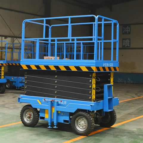 Heavy Duty Electric Scissor Lift Platform Featuring Smooth Hydraulic Action For Mobile Warehouse Cargo Hoisting And Adjustable Height, blue with black wheels.