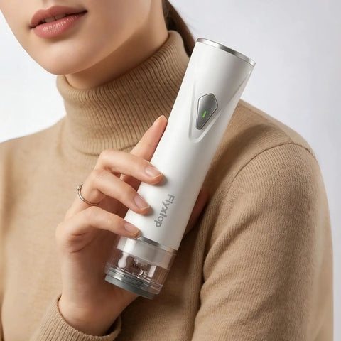Person holding a handheld vacuum sealer for food with automatic one-touch seal system for keeping items fresh longer.