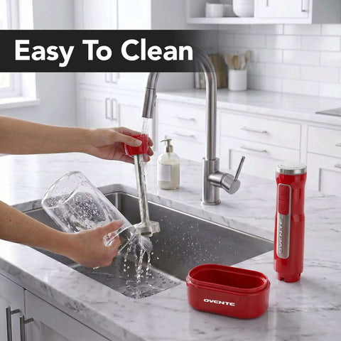 Rechargeable Cordless Hand Blender With 8 Speeds Red HR781R Portable USB C Kitchen Tool being cleaned in a sink.