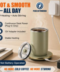 Gotta Have This Self Stirring Heated Coffee Mug With 10 Oz Auto Magnetic Mixing Cup Sage Green One Touch Electric Blender For Clump Free Coffee And Matcha Perfect Top Shelf Office Essential on a desk with steam rising.